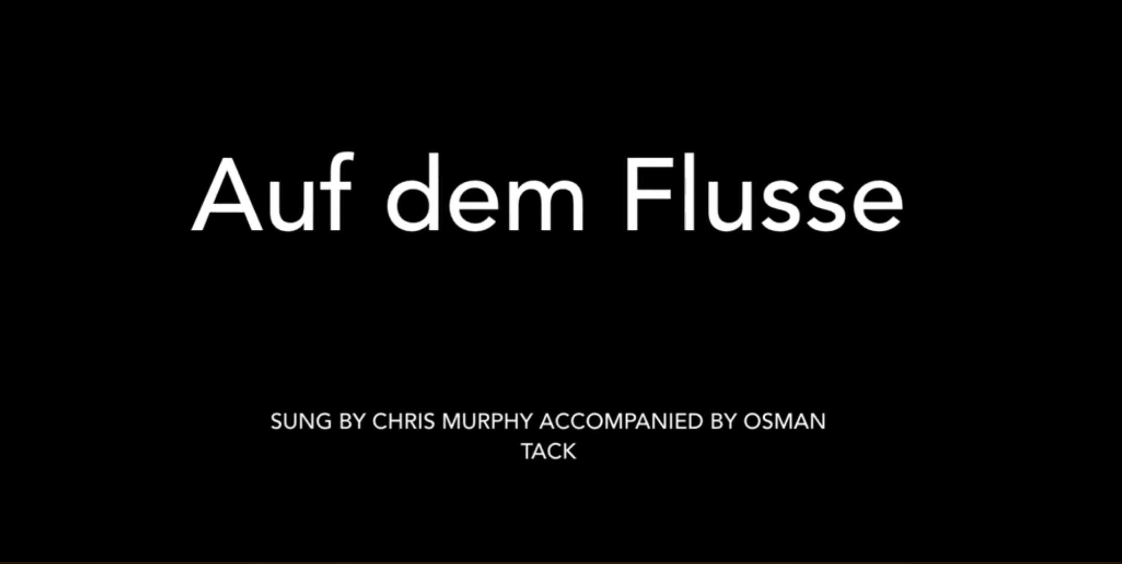 a title card with a link to a video of Chris Murphy singing Auf Dem Flusse by Franz Schubert accompanied by Osman Tack